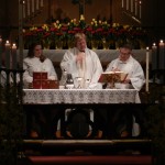 Fr. Charlie celebrates the Eucharist at the 8:30 service on Easter Day.